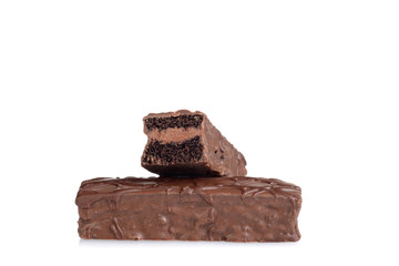 sliced chocolate bar cake on white