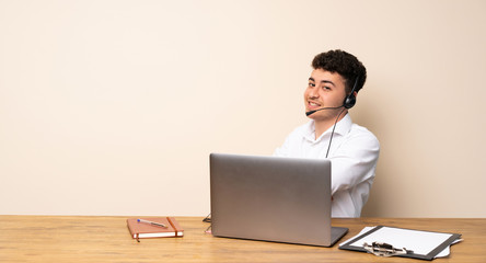 Telemarketer man with arms crossed and looking forward