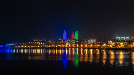 Fototapeta na wymiar View of the National Seaside Park at night, Baku city, Azerbaijan