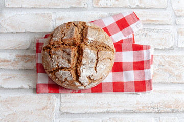 Farmers bread with a cross cut