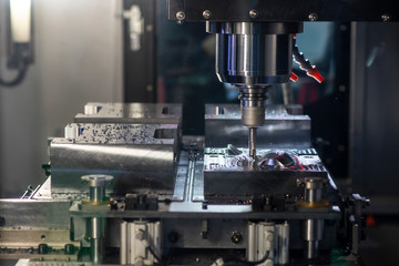 The  operation of CNC machining center cutting the mold parts .The CNC milling machine rough cutting  with the index-able radius end mill tool.