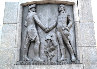 Fototapeta na wymiar LODZ, POLAND. A bas-relief with Tadeusz Kosciusko and George Washington's image. Fragment of a monument of Kosciusko