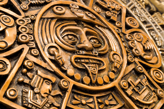 Oblique view of the central disk of the Aztec calendar, with the face of the solar deity Tonatiuth