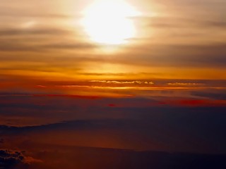 Fototapeta na wymiar Sunset seen from an airplane