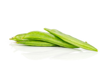 Group of three whole green sugar snap pea isolated on white background