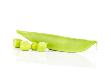 One whole green sugar snap pea pod with three peas isolated on white background