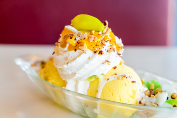mango ice-cream with sticky rice and whipped cream