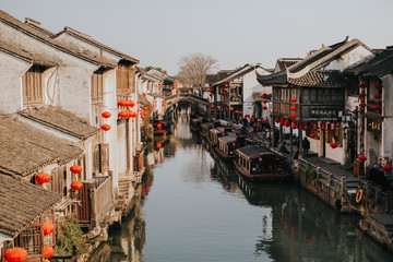 Fototapeta na wymiar Voyager sur l'eau à Suzhou - Chine