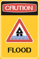 Caution. Flood. Sign. Information about the natural phenomenon dangerous to life and health in the area.