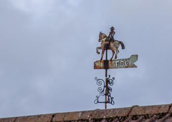 Obraz premium Old weather vane on roof