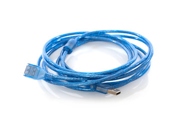 Blue cables connecting computer on a white background