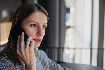 Fototapeta premium Happy successful business woman calling with cell telephone, Portrait of business woman making call via smart phone