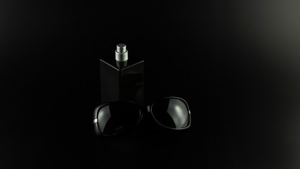 parfume and glasses on black background