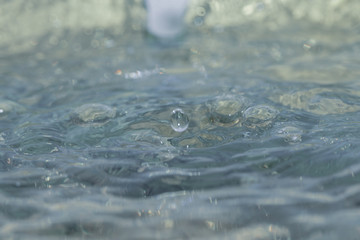 Drop of water in black and white background.Selective focus close up water.