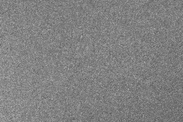 Fototapeta premium Granular abstract uniform grainy surface.