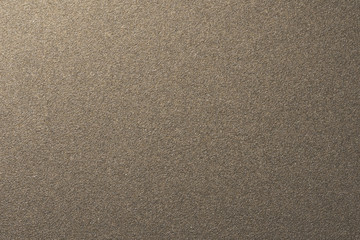 Granular abstract uniform grainy surface.