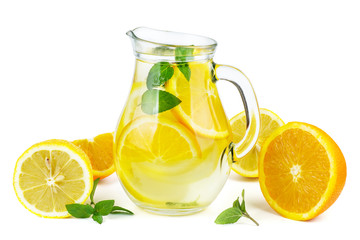 Glass jug with lemon water (or alcohol), slices and mint