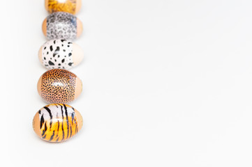 Animal print. Stylish set of Easter eggs on a white background. Easter concept, selective focus