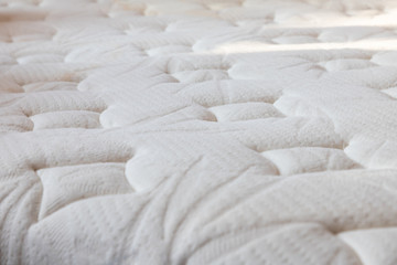 dust mites on bed, mattress background and texture. concept : allergy in bed room