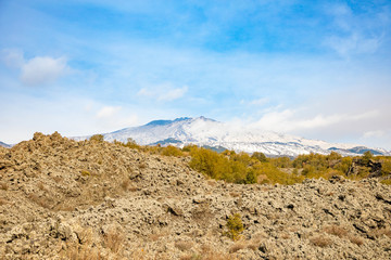 Etna Volcano with smoke in winter, volcano landscape from Catania, Sicily island, Italy