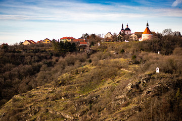 Fototapeta na wymiar Churchand village on a ridge near Znojmo, CZ. Light clouds, friendly atmosphere