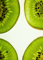 kiwi slices on a white background