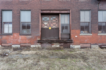 Forgotten loading dock to a long forgotten vintage red brick factory