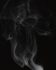 Fototapeta premium Abstract white smoke on black background