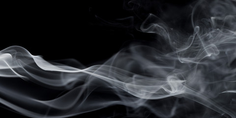 Abstract white smoke on black background