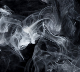 Abstract white smoke on black background