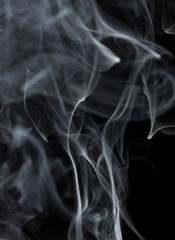 Abstract white smoke on black background