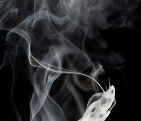 Obraz premium Abstract white smoke on black background
