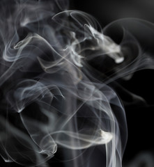 Abstract white smoke on black background