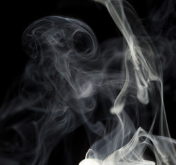 Abstract white smoke on black background