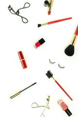 Makeup cosmetic accessories products  brushes, lipstick on white background top view, flat lay.  Copy space