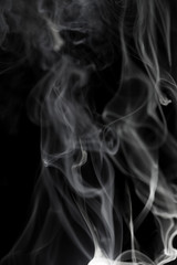 Abstract white smoke on black background