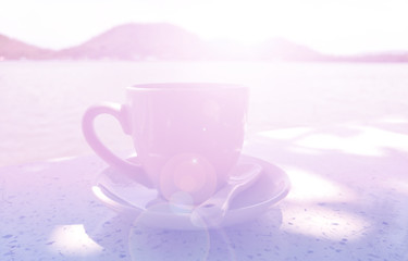 Coffee cup morning light background