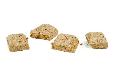 Wooden pressed briquet on a white isolated background.