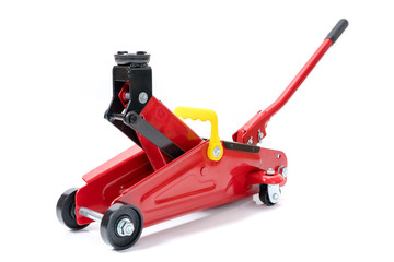 Red hydraulic floor jack isolated on white background