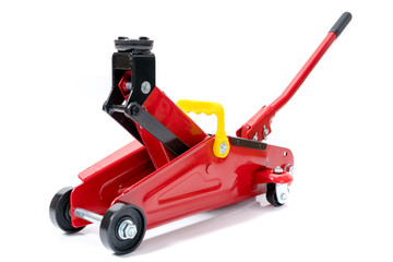 Red hydraulic floor jack isolated on white background - 257253924