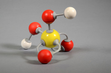 Molecule model of sulphic acid. White is hydrogen, yellow is suphur, red is oxygen.