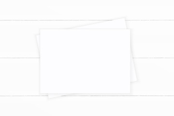Flat lay top view elegant white composition paper on wooden background. Xmas decoration design