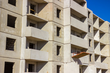 construction of multi-storey panel house. prefab house assembly