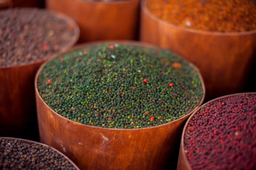 Colorful different spices, herbs in the spice market in Egypt - obrazy, fototapety, plakaty