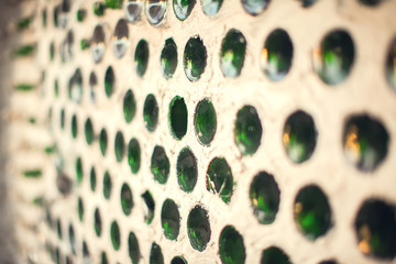 Glass bottles inside the wall background, abstract texture