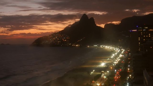 Dramatic timelapse sunset clouds over Ipanema Beach in Rio de Janeiro, Brazil