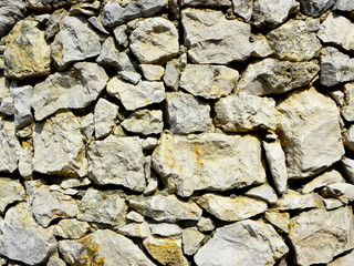 old stone wall of stones