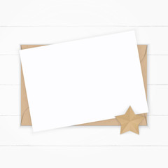 Flat lay top view elegant white composition paper kraft envelope star shape craft on wooden background
