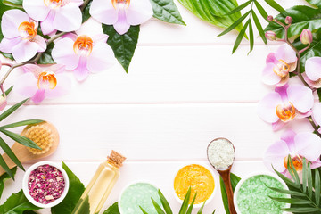 Beauty and fashion concept with spa set on pastel rustic wooden background.