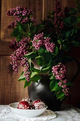 traditional decorated polish Easter eggs and lilac flowers